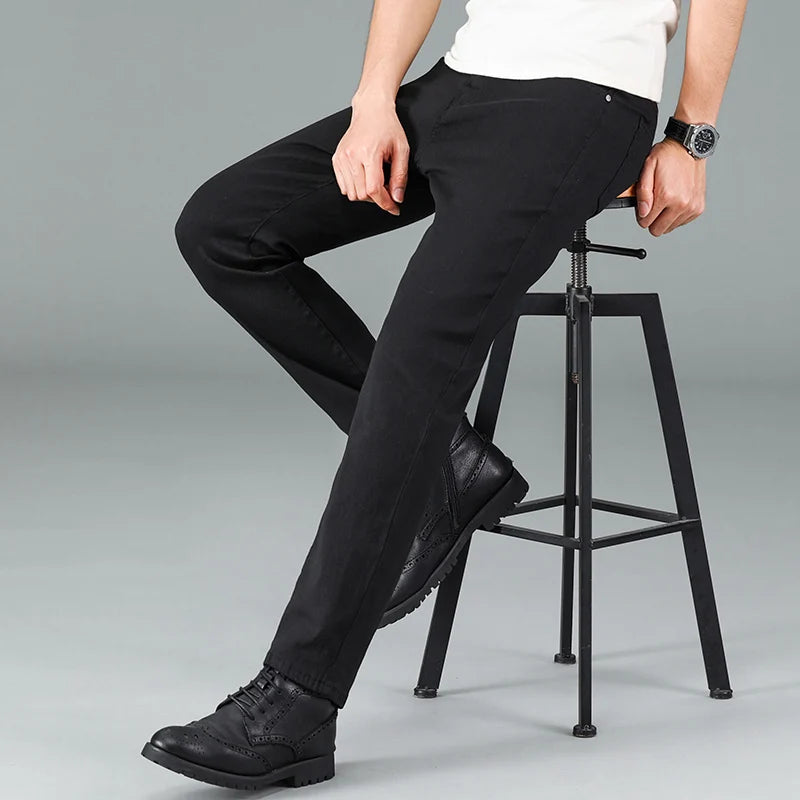 Men's pure black jeans Korean version trendy straight fit pants men's comfortable and elastic classic business jeans